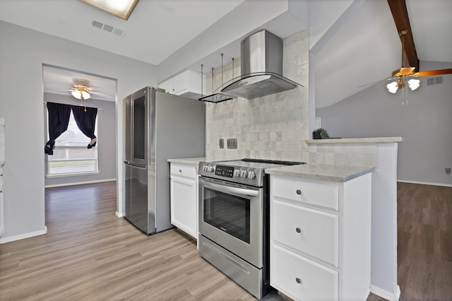 7357 Channel View Dr, Fort Worth, TX 76133 - kitchen with appliances with stainless steel finishes, wall chimney range hood, a ceiling fan, and light wood-style flooring