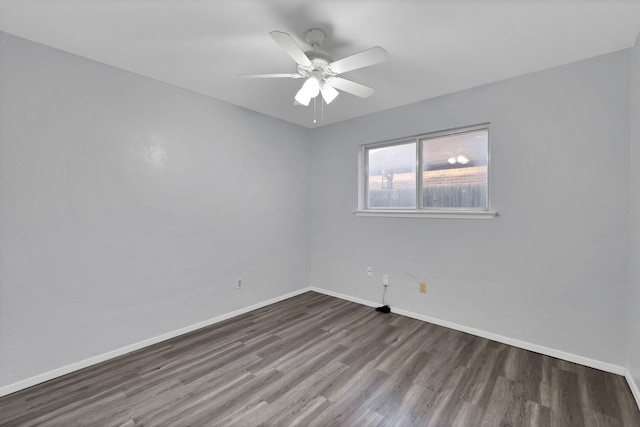 7357 Channel View Dr, Fort Worth, TX 76133 - spare room featuring wood finished floors, ceiling fan, and baseboards