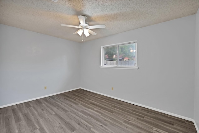 7357 Channel View Dr, Fort Worth, TX 76133 - spare room featuring wood finished floors, a ceiling fan, baseboards, and a textured ceiling