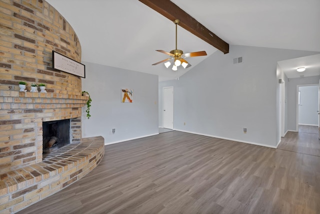 7357 Channel View Dr, Fort Worth, TX 76133 - unfurnished living room with wood finished floors, a ceiling fan, a brick fireplace, and baseboards