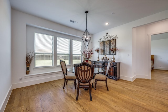 145 Chisolm Trl, Pottsboro, TX 75076 - dining area with a chandelier, baseboards, light wood-style flooring, and recessed lighting
