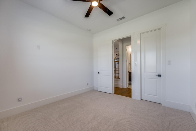 145 Chisolm Trl, Pottsboro, TX 75076 - unfurnished bedroom with light colored carpet, baseboards, and ceiling fan