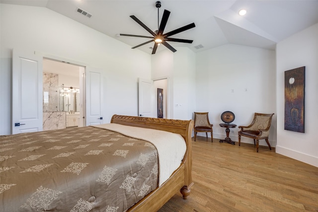 145 Chisolm Trl, Pottsboro, TX 75076 - bedroom with vaulted ceiling, baseboards, wood finished floors, and connected bathroom