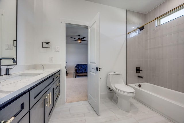 145 Chisolm Trl, Pottsboro, TX 75076 - full bath with ensuite bathroom, vanity, a ceiling fan, toilet, and shower / tub combination