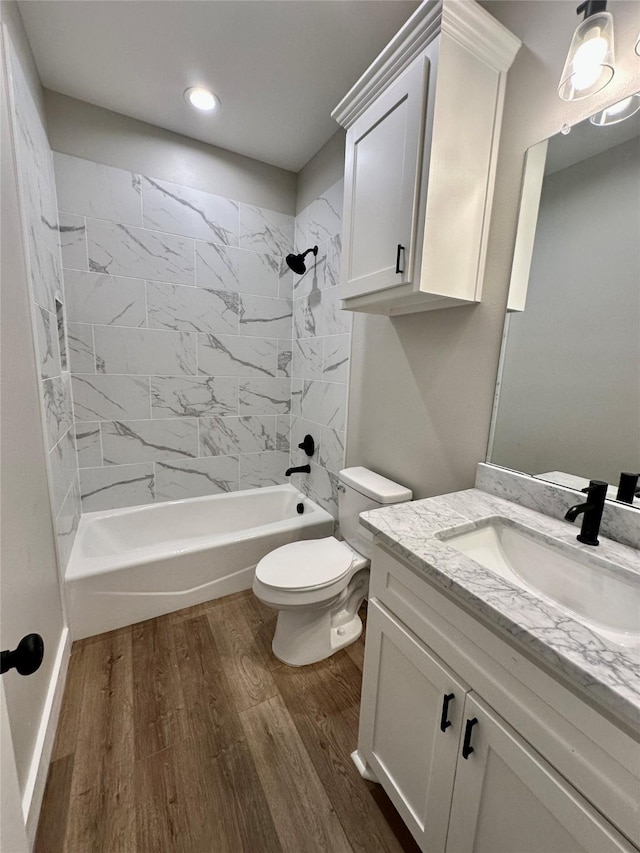 913 Carter, Sulphur Springs, TX 75482 - full bathroom featuring wood finished floors, tub / shower combination, toilet, and vanity