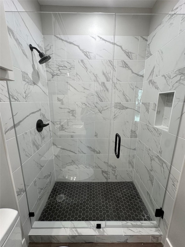 913 Carter, Sulphur Springs, TX 75482 - bathroom featuring toilet and a stall shower