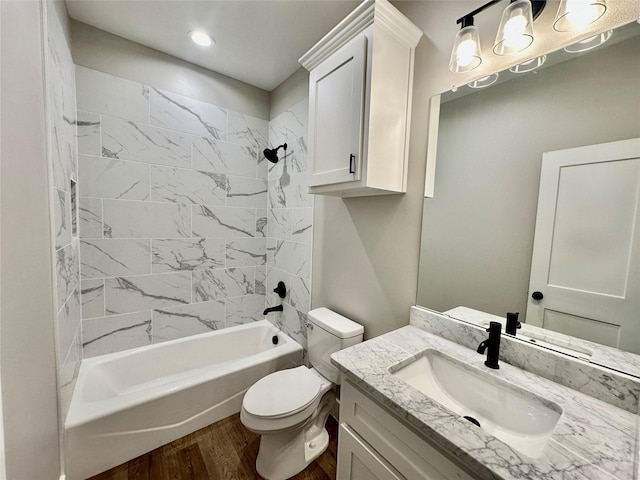 913 Carter, Sulphur Springs, TX 75482 - full bathroom featuring wood finished floors, toilet, shower / washtub combination, and vanity