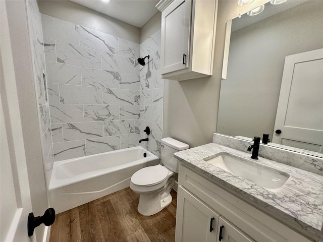 913 Carter, Sulphur Springs, TX 75482 - full bath featuring wood finished floors, vanity, toilet, and  shower combination