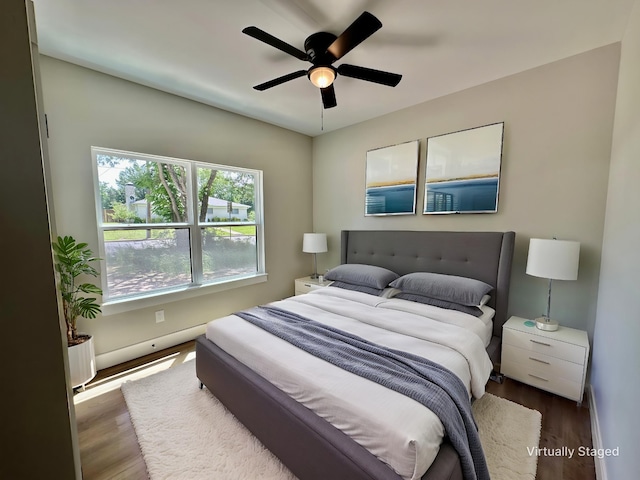 913 Carter, Sulphur Springs, TX 75482 - bedroom with wood finished floors, baseboards, and ceiling fan