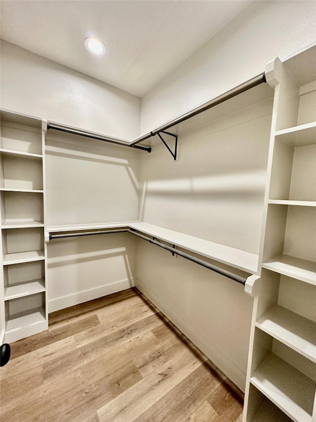 913 Carter, Sulphur Springs, TX 75482 - spacious closet featuring light wood finished floors