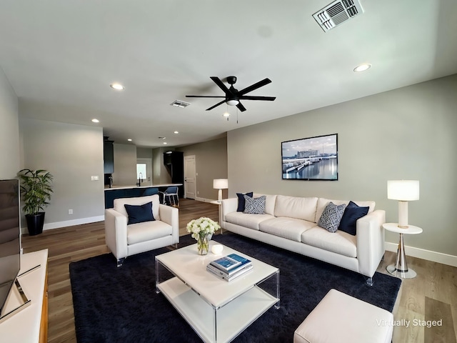 913 Carter, Sulphur Springs, TX 75482 - living area with baseboards, wood finished floors, recessed lighting, and a ceiling fan