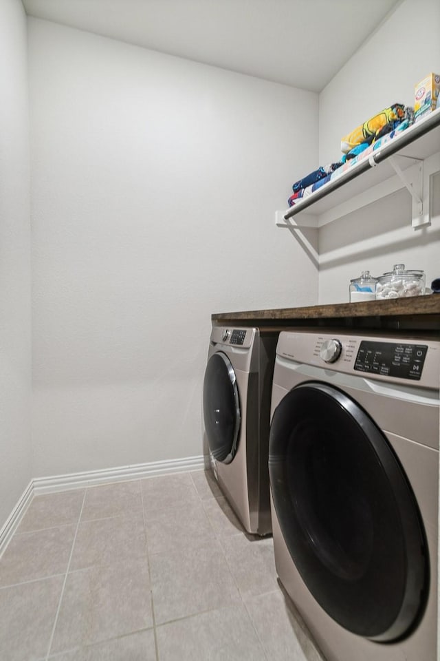 1904 Tomahawk Trl, Aubrey, TX 76227 - clothes washing area with separate washer and dryer, baseboards, and light tile patterned floors