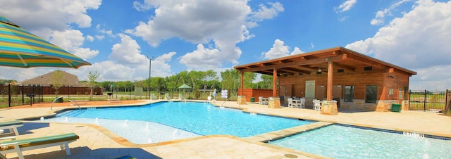 1904 Tomahawk Trl, Aubrey, TX 76227 - view of pool with a patio area, fence, and a pool with connected hot tub
