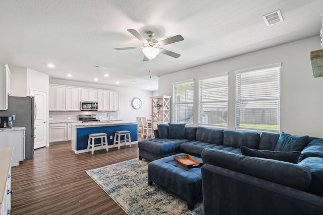 1904 Tomahawk Trl, Aubrey, TX 76227 - living room with a ceiling fan, dark wood-style floors, and recessed lighting