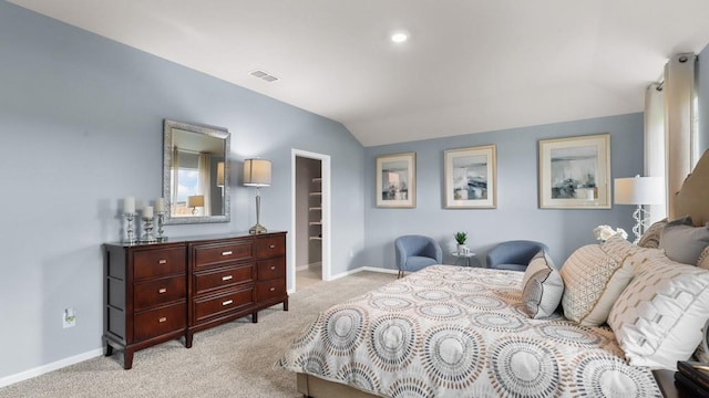 509 Marsh St, Cleburne, TX 76033 - bedroom with light carpet, a spacious closet, vaulted ceiling, baseboards, and a closet