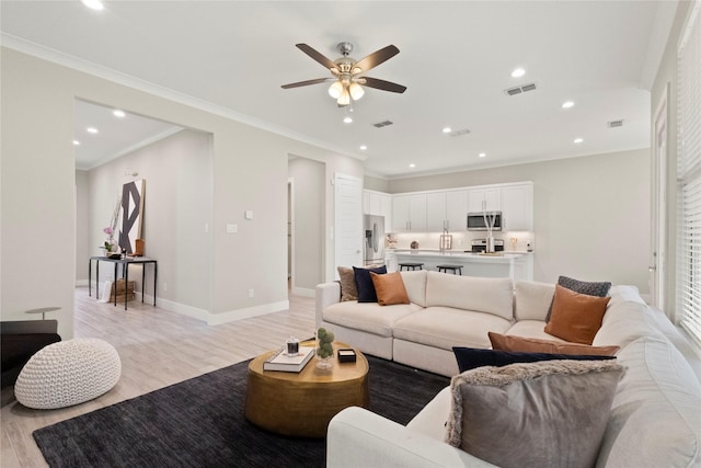 2027 Shaw St, Dallas, TX 75212 - living room with a ceiling fan, light wood-type flooring, recessed lighting, ornamental molding, and baseboards