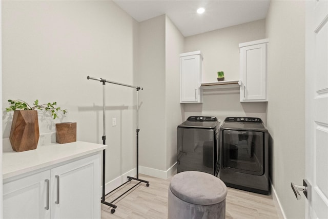 2027 Shaw St, Dallas, TX 75212 - laundry area with cabinet space, washer and clothes dryer, light wood-type flooring, baseboards, and recessed lighting