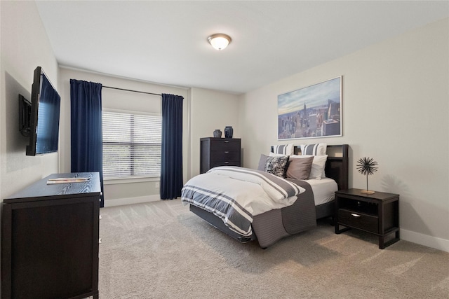 2027 Shaw St, Dallas, TX 75212 - bedroom featuring light colored carpet and baseboards