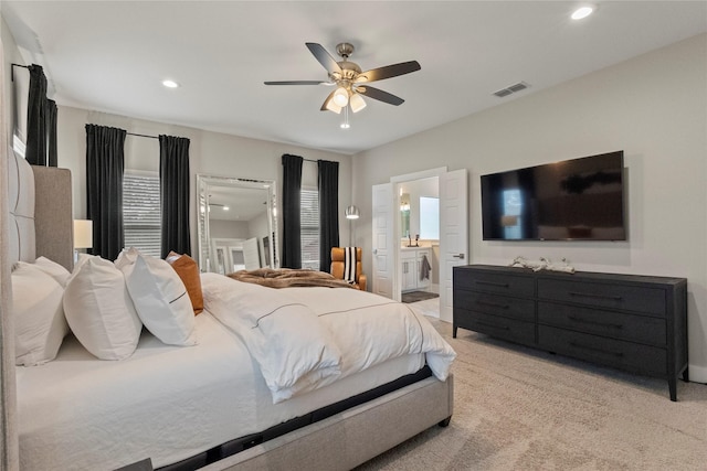 2027 Shaw St, Dallas, TX 75212 - bedroom featuring recessed lighting, light carpet, ensuite bath, ceiling fan, and baseboards