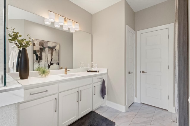 2027 Shaw St, Dallas, TX 75212 - bathroom featuring marble look tile flooring and vanity