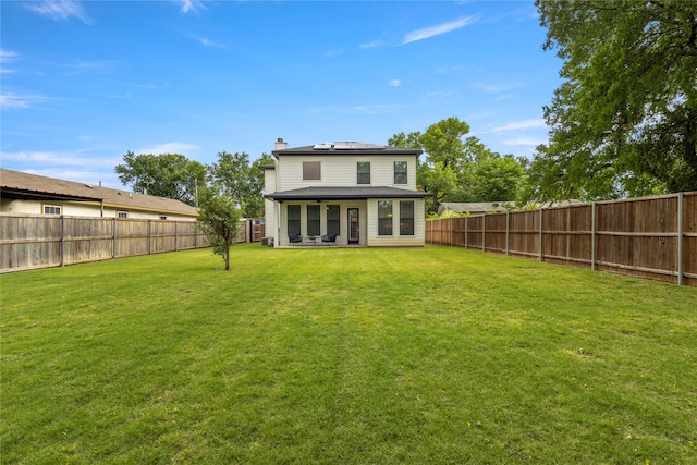 2027 Shaw St, Dallas, TX 75212 - back of property with a chimney and solar panels