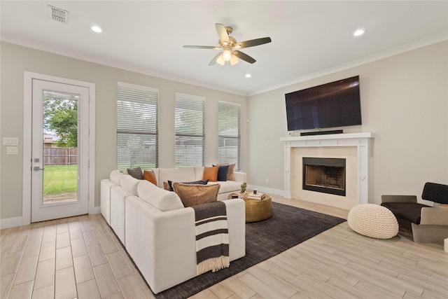 2027 Shaw St, Dallas, TX 75212 - living room with ceiling fan, wood finished floors, a premium fireplace, recessed lighting, and baseboards