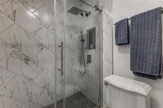 2929 Forest Park Dr, Garland, TX 75040 - bathroom featuring a marble finish shower and toilet
