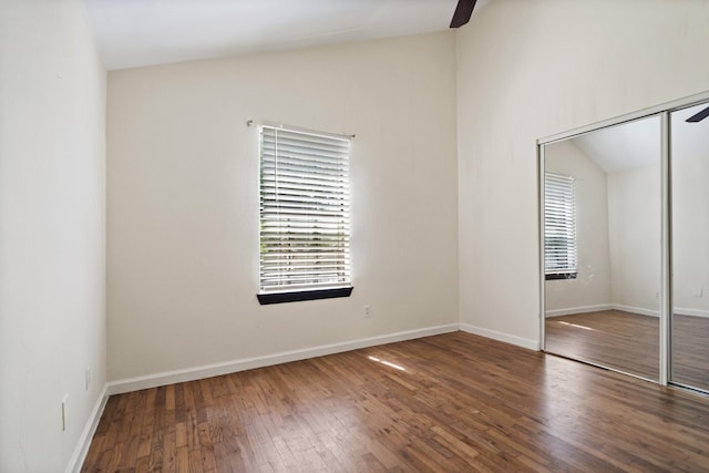 4104 Meandering Ct, Lakeside, TX 76135 - unfurnished bedroom featuring vaulted ceiling, wood finished floors, a closet, baseboards, and a ceiling fan