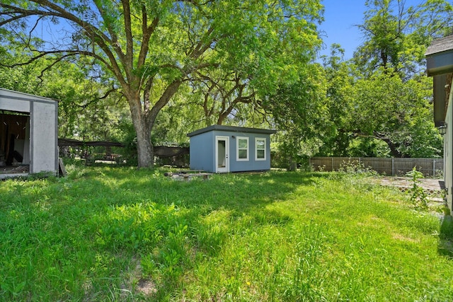 4104 Meandering Ct, Lakeside, TX 76135 - view of yard featuring a storage unit, an outbuilding, and fence