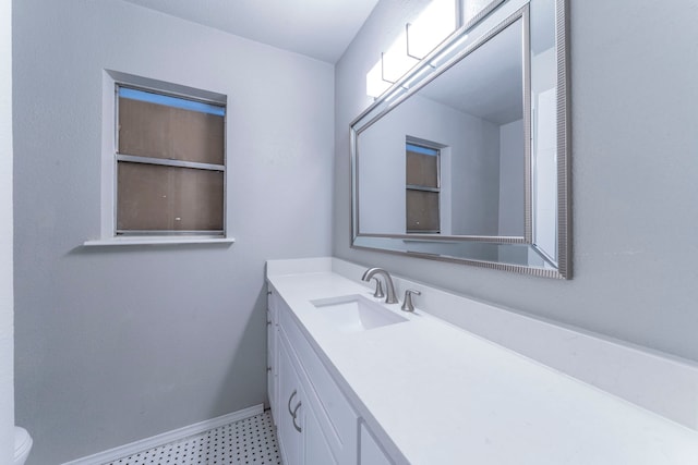 1725 Camara Ct, Grand Prairie, TX 75051 - bathroom with vanity, baseboards, and toilet