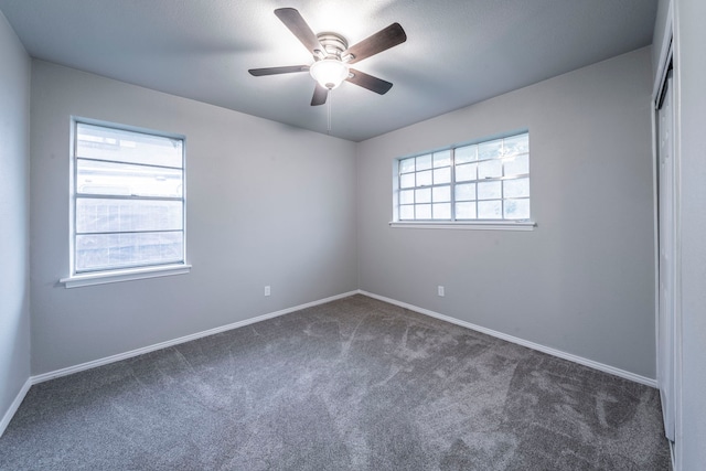 1725 Camara Ct, Grand Prairie, TX 75051 - unfurnished room featuring carpet, baseboards, and a ceiling fan