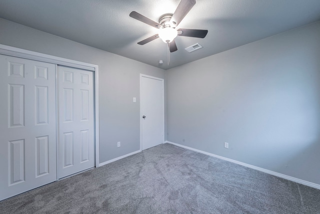 1725 Camara Ct, Grand Prairie, TX 75051 - unfurnished bedroom with carpet, baseboards, a closet, and ceiling fan
