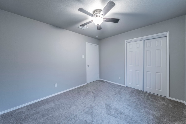 1725 Camara Ct, Grand Prairie, TX 75051 - unfurnished bedroom featuring carpet, baseboards, a closet, and a ceiling fan