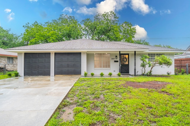 1725 Camara Ct, Grand Prairie, TX 75051 - ranch-style house with an attached garage, driveway, brick siding, roof with shingles, and covered porch