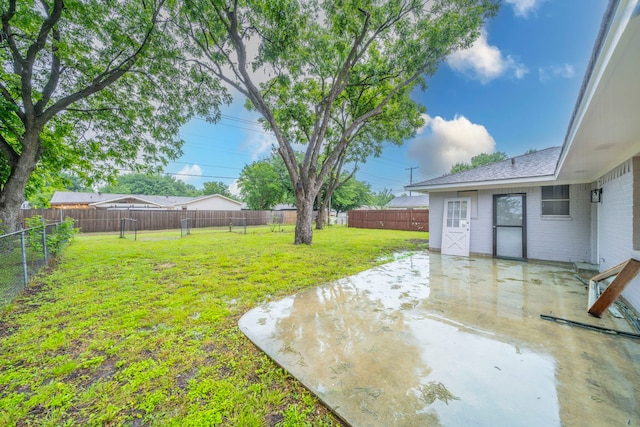 1725 Camara Ct, Grand Prairie, TX 75051 - view of yard with a patio area