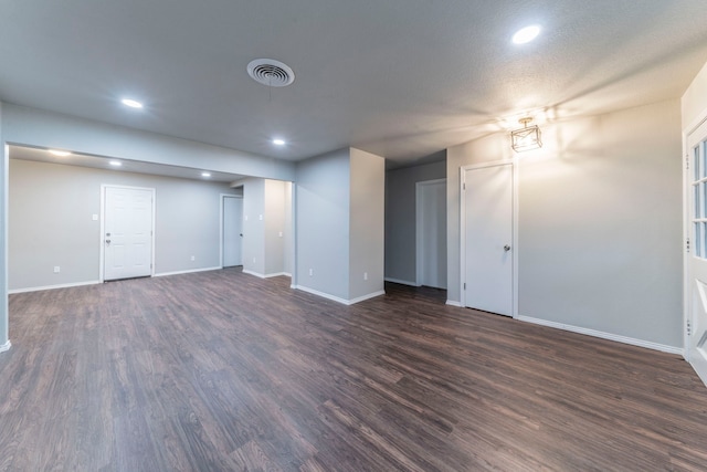 1725 Camara Ct, Grand Prairie, TX 75051 - unfurnished living room with dark wood finished floors, baseboards, and recessed lighting