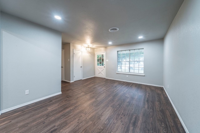1725 Camara Ct, Grand Prairie, TX 75051 - spare room with baseboards, dark wood-style flooring, and recessed lighting