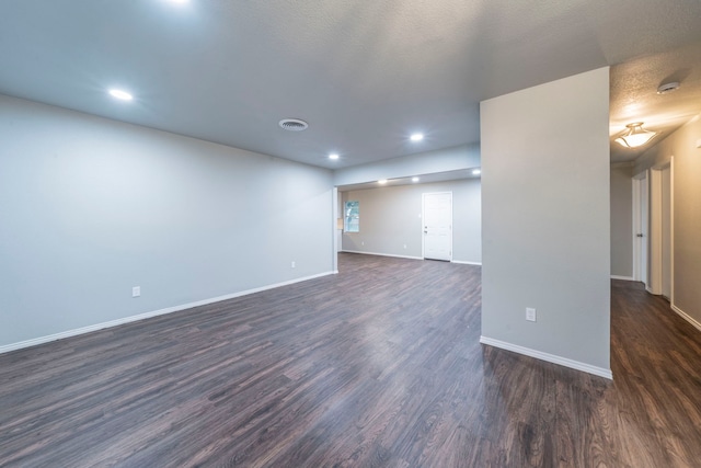 1725 Camara Ct, Grand Prairie, TX 75051 - spare room featuring dark wood-style floors, baseboards, and recessed lighting