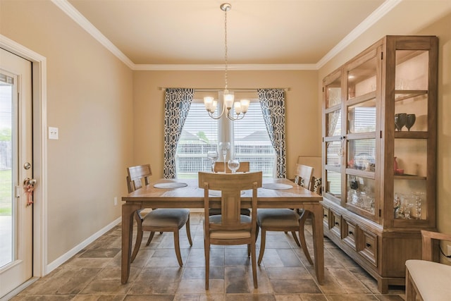 7314 Boulder Star Way, Temple, TX 76502 - dining room with a chandelier, ornamental molding, baseboards, and dark stone finish floors