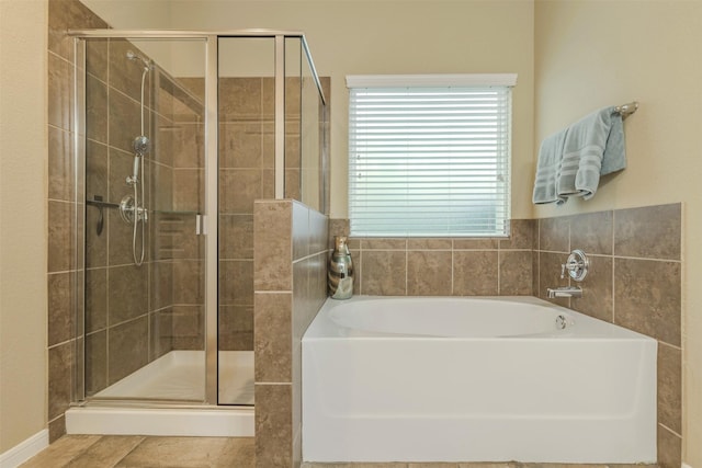 7314 Boulder Star Way, Temple, TX 76502 - full bathroom featuring a stall shower and a bath