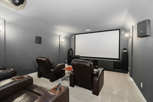 713 Calm Crest Dr, Rockwall, TX 75087 - home theater with light carpet, vaulted ceiling, and baseboards