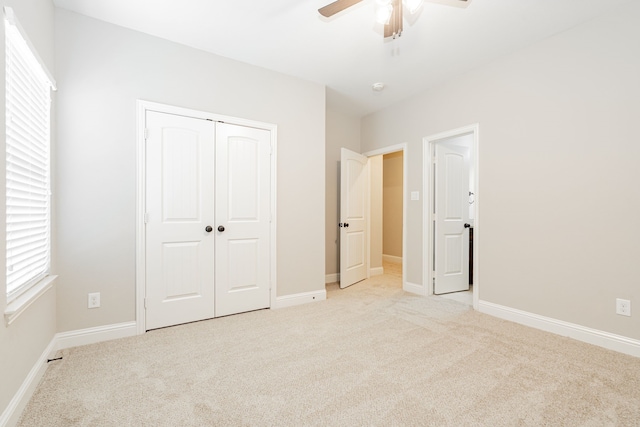 713 Calm Crest Dr, Rockwall, TX 75087 - unfurnished bedroom with light colored carpet, a closet, ceiling fan, and baseboards