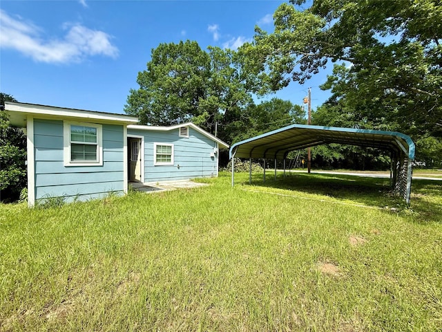 816 Bradleys Bnd, Tool, TX 75143 - view of grassy yard featuring a carport