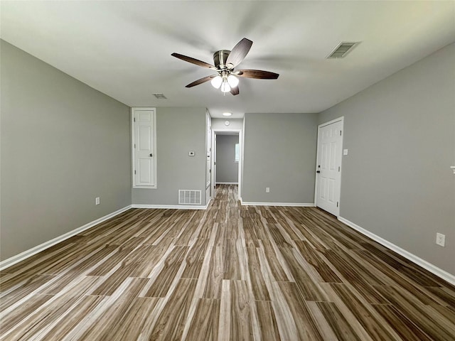 816 Bradleys Bnd, Tool, TX 75143 - unfurnished living room featuring wood finished floors, baseboards, and ceiling fan