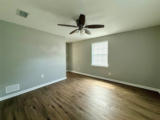 816 Bradleys Bnd, Tool, TX 75143 - unfurnished room featuring ceiling fan, dark wood finished floors, and baseboards