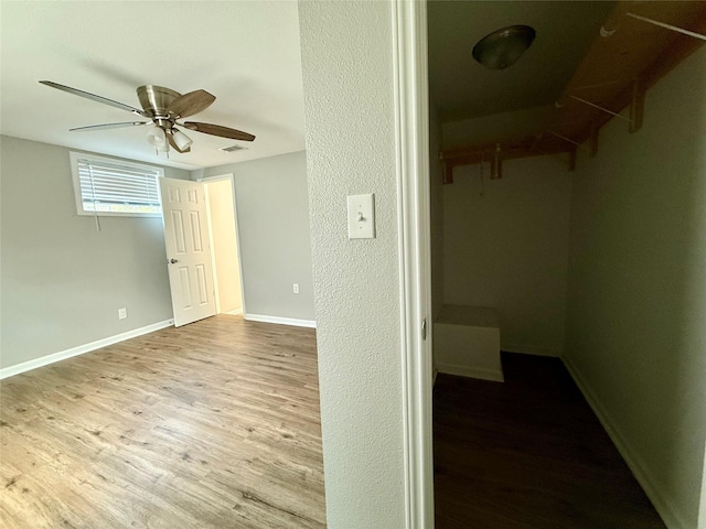 816 Bradleys Bnd, Tool, TX 75143 - unfurnished bedroom featuring wood finished floors, baseboards, and a ceiling fan