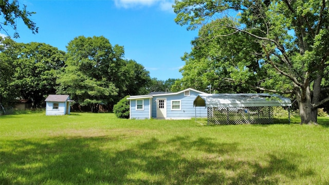 816 Bradleys Bnd, Tool, TX 75143 - view of grassy yard featuring a shed and an outdoor structure