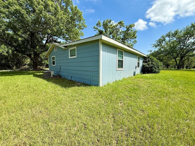 816 Bradleys Bnd, Tool, TX 75143 - view of home's exterior featuring central air condition unit and a lawn