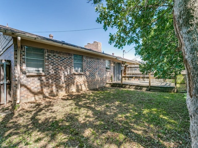 508 Billie Ruth Ln, Hurst, TX 76053 - rear view of house with brick siding and a chimney