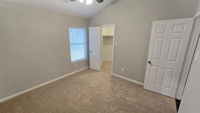 7305 Moon Ridge Ct, Fort Worth, TX 76133 - unfurnished bedroom featuring lofted ceiling, carpet flooring, a spacious closet, baseboards, and a ceiling fan